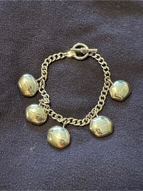 Silver plated Cerritos Inspirational charm bracelet. 6.5” in length.
